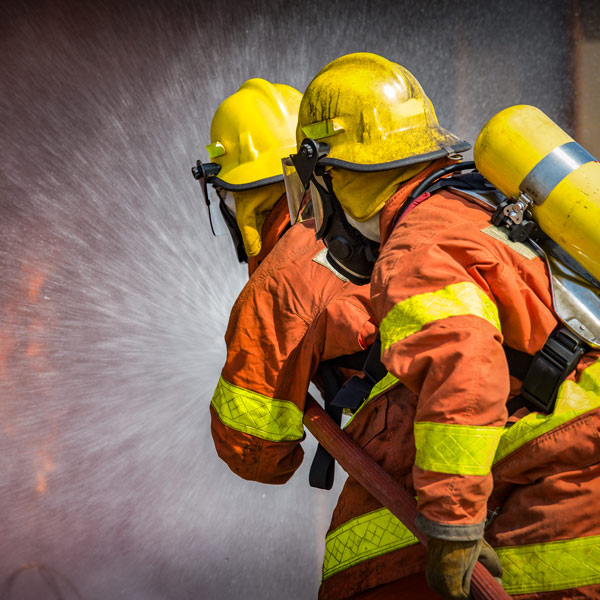 fire fighters battling fire